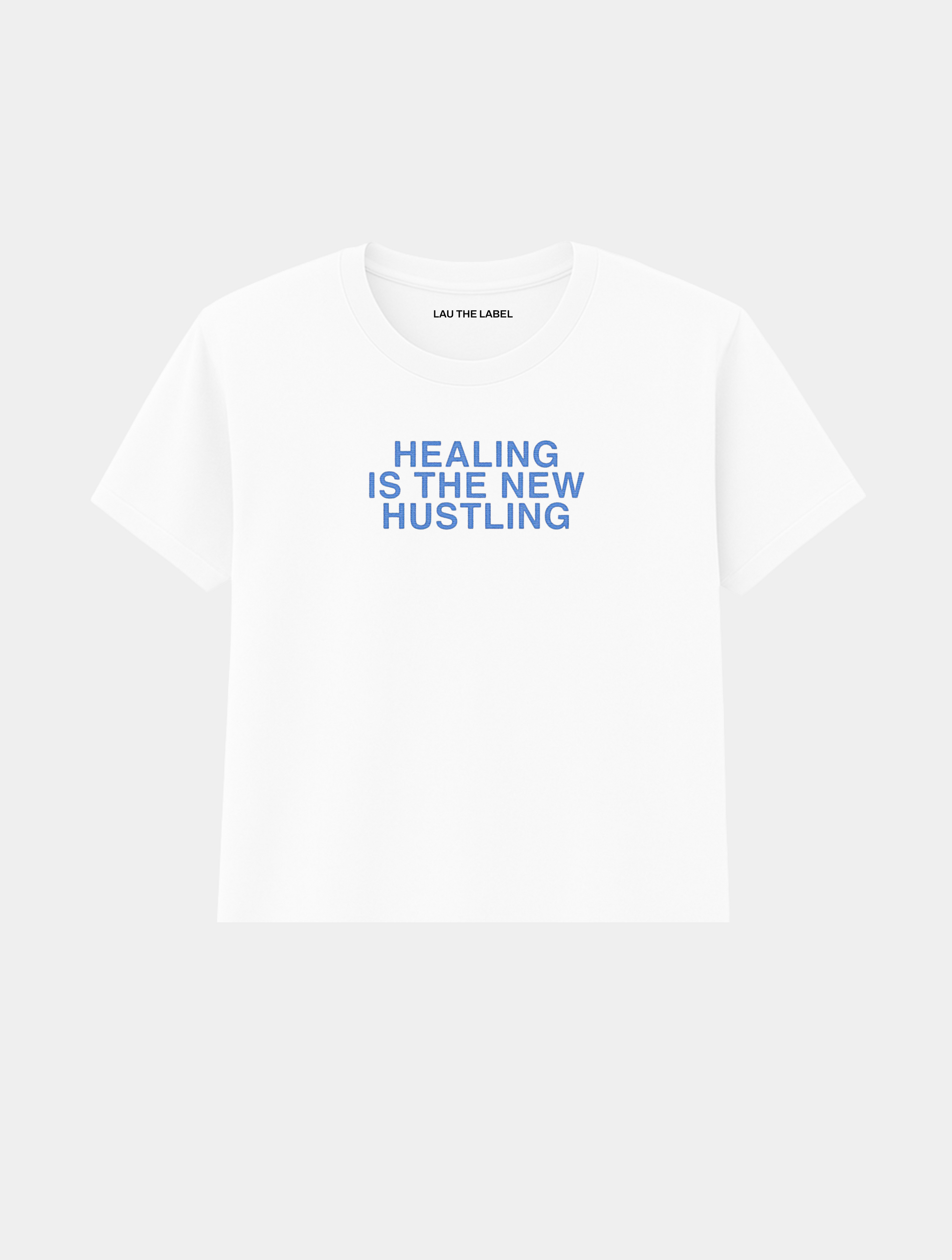 HEALING IS THE NEW HUSTLING BABY CROPPED TEE